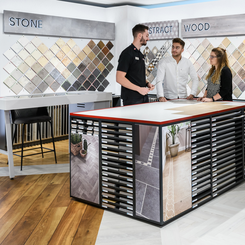 Couple having a karndean design consultation 