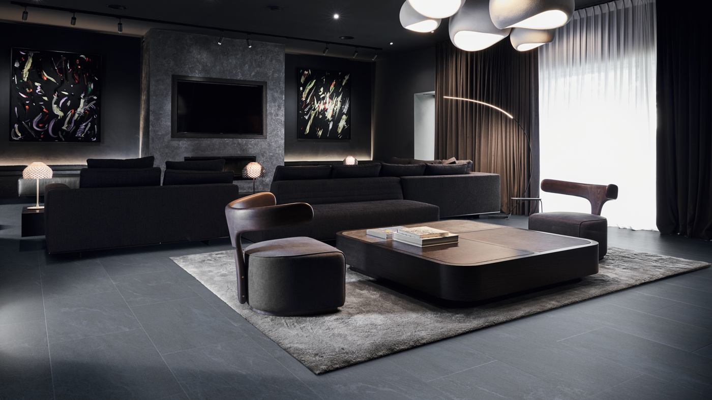 Lago Quartzite floors add to the moody In CTRL aesthetic in this living room