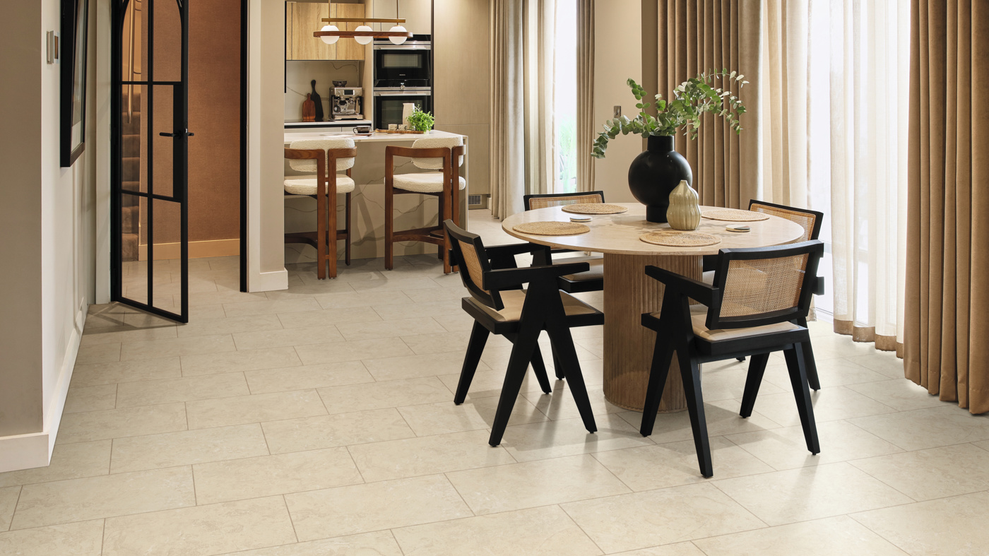 Natural Limestone and DS12-3 design strips form a grouted effect in a calm kitchen and dining area