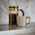 Brass french press and coffee mug