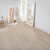 Knight Tile Coastal sawn oak light brown lvt flooring in a retail shop