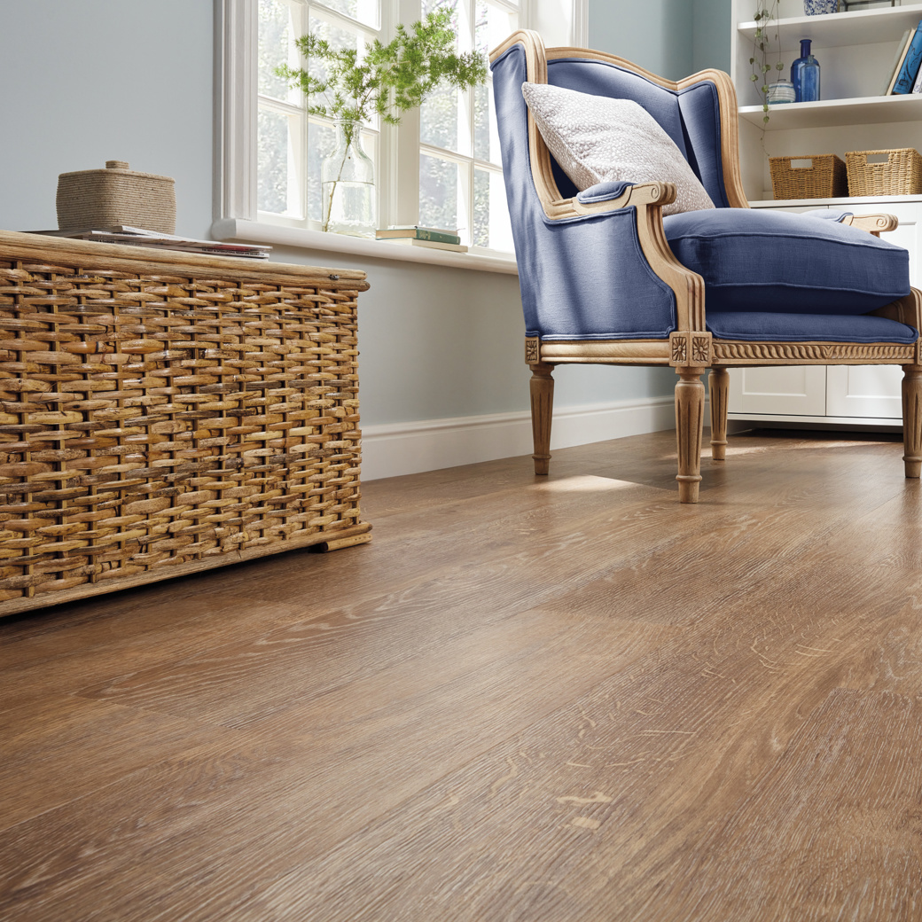 Honey Oak rigid core lvp floors in a living room; Van Gogh collection