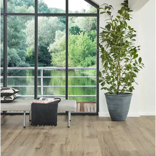 Van Gogh Baltic Washed Oak mid brown LVT flooring in a living room